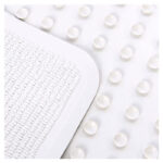 Badkarsmattan placerad i ett vitt badkar