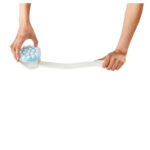 Krämpåstrykaren hållen av hand mot rygg