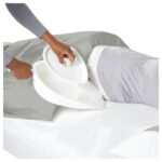 Vitt sängbäcken ovanifrån med tätt lock