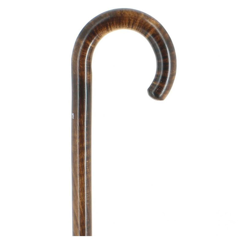 Cannes Fayet käpp lönn krok handtag Cannes Fayet käpp lönn krok – närbild på krokhandtag i bränt lönnträ med tydlig ådring, klassisk fransk brukskäpp