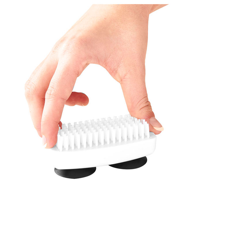 Borsten fastsatt på handfat med sugkoppar