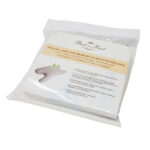 Vitt kuddfodral ovanifrån med fjärilsform