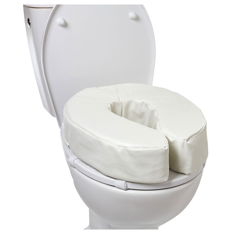 Mjuk Vitility toalettsitsförhöjare monterad på vit toalett