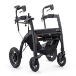 Elektrisk rollator i rollatorläge med handtag och sits