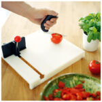Fixeringsbräda med piggplatta för att skära grönsaker
